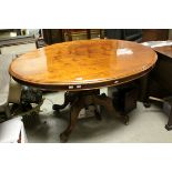 Victorian Oval Tilt Top Loo Table raised on a turned column and quadruple splayed legs with