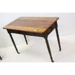 19th century Mahogany Table with Drawer to end and raised on turned slender tapering legs with