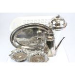 A quantity of silver plate to include a pair of bottle coasters in Rococo style together with