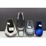 Three Whitefriars Smokey Glass Vases, tallest 20cms high together with a Studio Blue Glass Vase