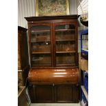Victorian Mahogany Bureau Bookcase, the upper section with two glazed doors opening to three