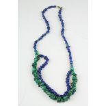 Lapis Lazuli and malachite bead necklace, the single strand dividing to become two strands, polished