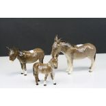 Three Beswick Donkeys including model no. 2267, model no. 1364B and Donkey Foal model no. 2110