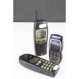 Two retro Nokia mobile phones together with an Ericsson cell phone (3)