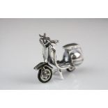 Silver figure of a Scooter with articulated Steering Wheel and Rubber Tyres