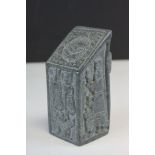 A profusely Carved hard stone South American aztec style plinth in the form of a paperweight.