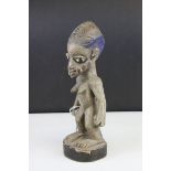 African Carved Figure of a Woman, 29cms high