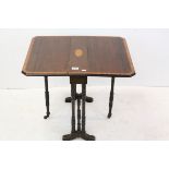 Edwardian Mahogany Inlaid Sutherland Table raised on turned ringed legs, 54cms long x 57cms high