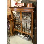 Edwardian Mahogany Inlaid Display Cabinet with twin ornate astragel glazed doors opening to reveal