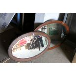 Edwardian Mahogany Inlaid Oval Framed Mirror, 87cms long together with another Oval Mirror