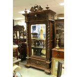 19th century Heavily Carved Oak Armoire / Wardrobe, carved throughout including face masks and