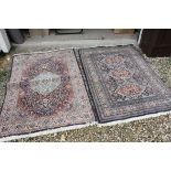 Two similar Blue Ground Rugs with Persian Style Pattern, each 172cms x 117cms