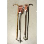 Two Shooting Sticks, Horn Handled Walking Stick and another Walking Stick