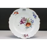 An early 20th century Meissen cabinet plate with floral decoration crossed sword mark to underside.