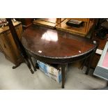 19th century Mahogany Demi-Lune Side Table with carved edge and raised on square tapering legs,