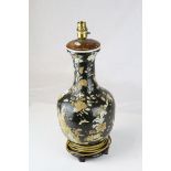 Chinese / Japanese Ceramic Table Lamp decorated with Figures and Text on a Black Ground , 38cms