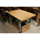 Late 19th century Pine Kitchen Table on Turned Legs and Castors