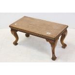 Mahogany Footstool raised on cabriole legs and pad feet, 61cms long x 29cms high