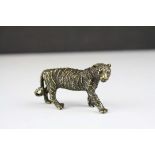 A brass/bronze figure of a Tiger.