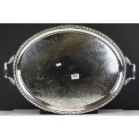 Large Silver Plated Oval Serving Tray with Twin Handles, chaste border and leaf engraving, 65cms
