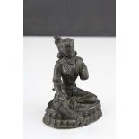 A bronze Indian seated deity, stands approx 11cm in height