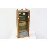 Pine Hanging Cabinet with single glazed door and shelves, 28cms wide x 69cms high
