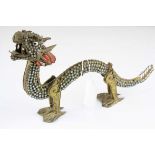 Chinese metal dragon figurine, the body set with Turquoise coloured stones, and red coloured