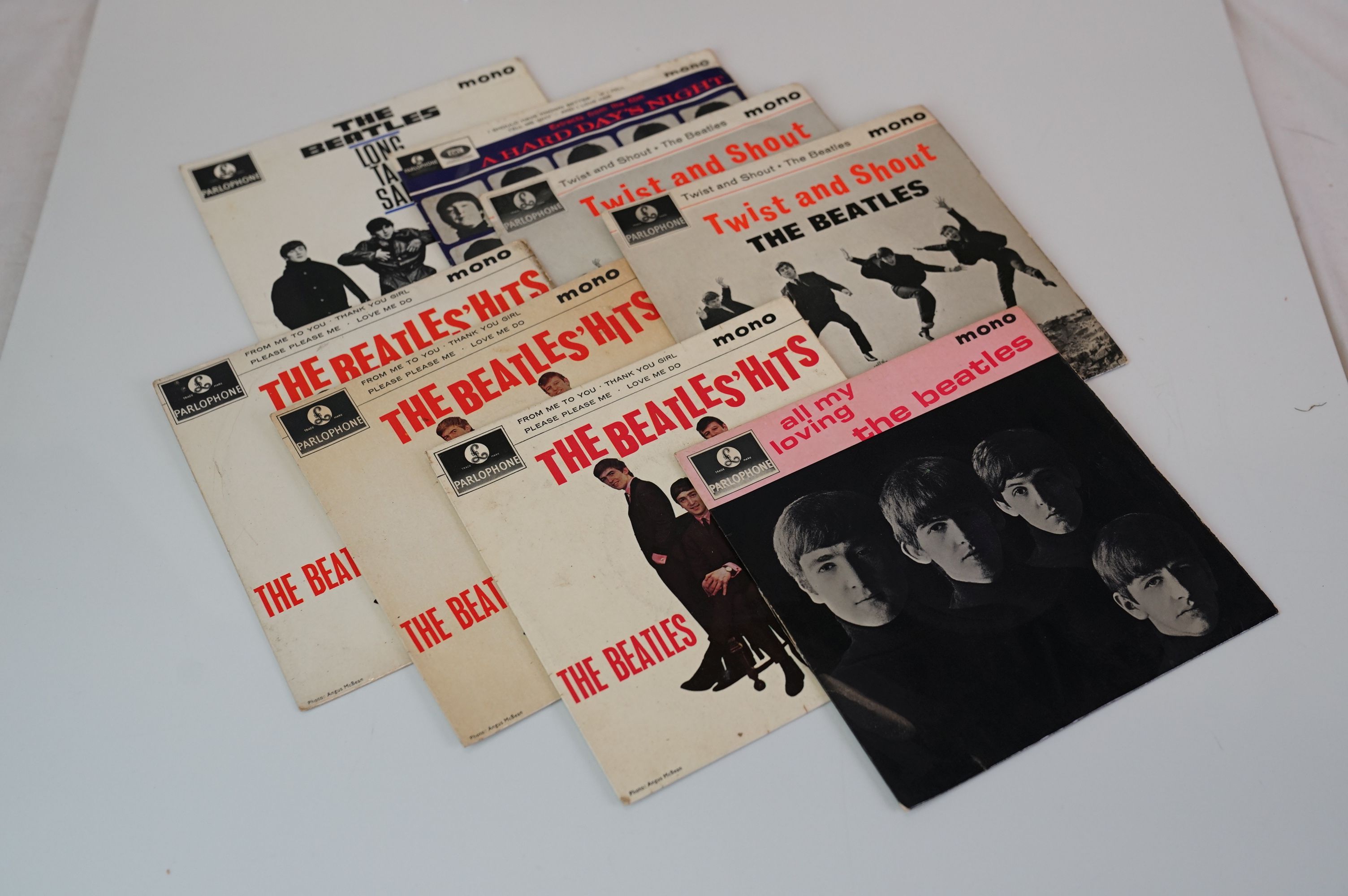 Vinyl - Eight The Beatles EPs / 45s with picture sleeves to include Long Tall Sally, Hard Days