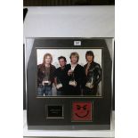 Music Autographs - Framed & glazed Bon Jovi presentation montage signed by the band, with COA from