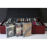 Cassettes - Case containing 32 cassette tapes to include Rolling Stones, Eagles, Simply Red etc