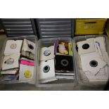 Vinyl - large quantity of 45's in card sleeves spanning genres and decades. Condition of the vinyl