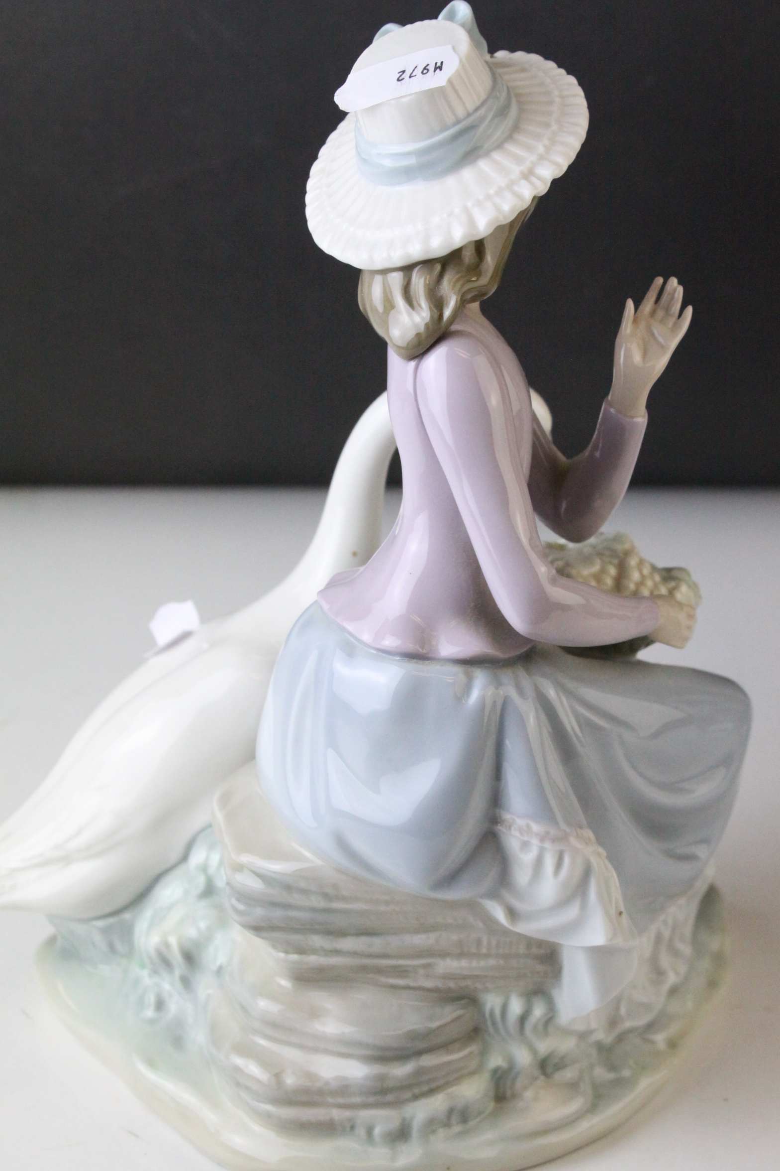 Two Lladro Figures, Caress and Rest, model no. 1245, 21cms high and a Seated Girl holding Flower - Image 5 of 10