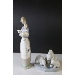 Lladro Figure of a Girl holding a Kid Goat, 27cms high together with a Lladro Model of Polar Bears '
