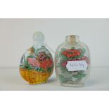 Glass Snuff Bottle painted in enamels with flowers in a basket decoration, signed to base, 8cms high