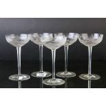 Five Glass Champagne Coups / Cups, each bowl etched with a scene of Stags in Woodland, 18cms high