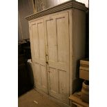 Large 19th century Painted Pine Housekeeper's Cupboard, the two panel doors opening to reveal five