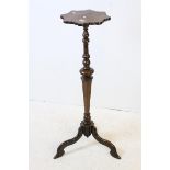 19th century Walnut Torchere in the William and Mary Style, shaped top and raised on a turned column