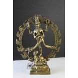 Vintage Brass Statue of an Indian Deity standing on a Buddha's Back