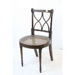 Regency Style Side Chair with floral painted decoration and caned seat, 84cms high