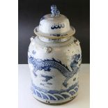 Large Chinese Ceramic Temple Jar and Cover, decorated with a Dragon, 52cms high