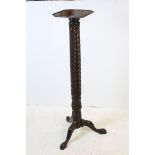 Mahogany Jardiniere Stand with carved column support raised on three splay feet, 120cms high