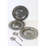 Three Antique Pewter Plates and Two Spoons, with touch marks, plates 25cms diameter