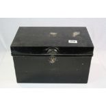 A vintage black metal deed strong box.