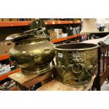 Two Large Brass Jardiniere with Lion Mask and Ring Handles, largest 51cms diameter together with a