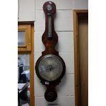 An early 19th century mahogany Fagioli & Sons banjo wheel barometer.
