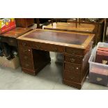 Victorian Mahogany Twin Pedestal Desk with leather inset top and an arrangement of nine drawers,