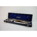 Cased Romilly ' Graduate ' Flute by Rudall, Carte & Co, London, the mouth piece stamped Sterling