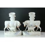 Pair of 19th century Staffordshire Pottery White Glazed Cow and Calf Spill Vases, 31cms high