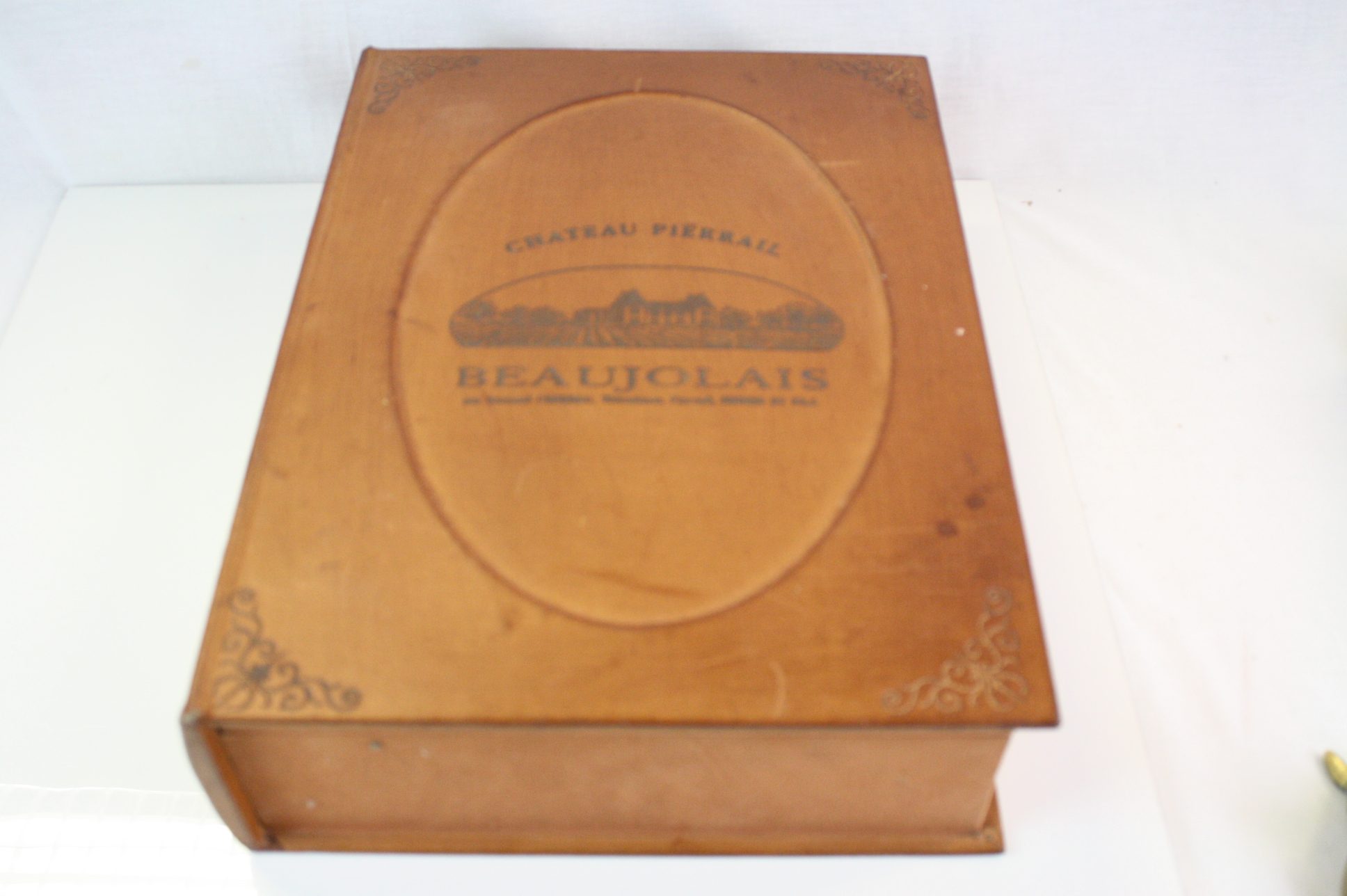 A vintage folding book rest a novelty box in the form of a book and a pair of brass candle sticks. - Image 6 of 7