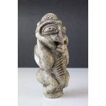 Carved Stone Tribal Figure of a Stylised Man